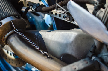 Closeup on motorbike metal engine parts