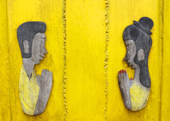Wood doll thank you on wood yellow.