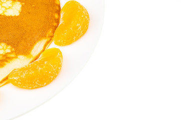 pancake and orange on white plate