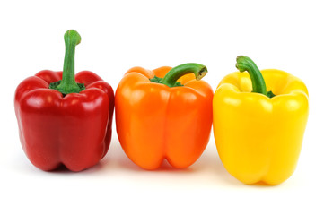 colorful peppers isolated on white background