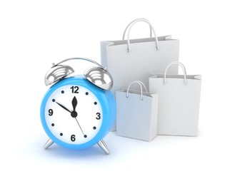 alarm clock and shopping bag (time to buy concept)