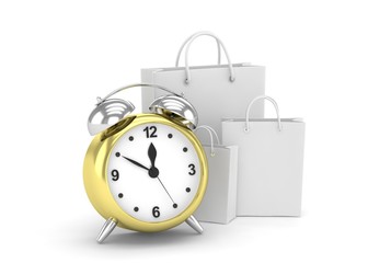 alarm clock and shopping bag (time to buy concept)