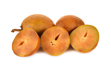 ripe sapodilla fruit with stem on white background