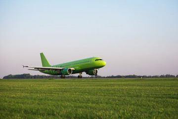 green plane taking off