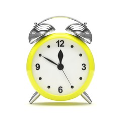 Yellow alarm clock on white