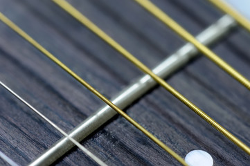 Guitar strings and frets