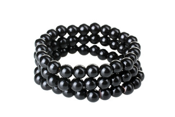 bracelet of beads or black pearls handmade isolated on white background