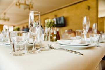 Wedding glasses filled with champagne at the banquet