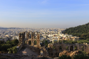 Fototapeta premium Ancient theatre under Acropolis of Athens and view of city, Greece