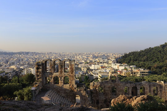 Ancient theatre under Acropolis of Athens and view of city, Greece