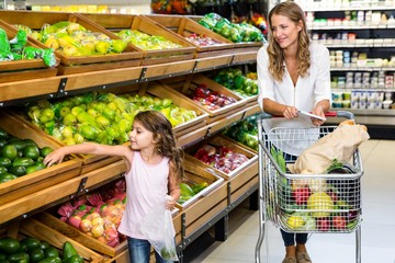 Mother and daughter doing shopping  