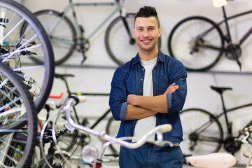 Salesman in bicycle shop 
