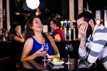Couple having a glass of wine