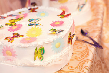white wedding cake with butterflies