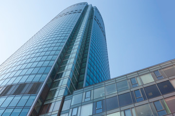 Fototapeta na wymiar Blue skyscraper facade
