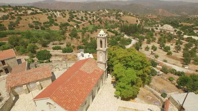 Revealing aerial shot of a church in Cyprus 
