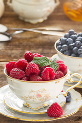 raspberries  in cup