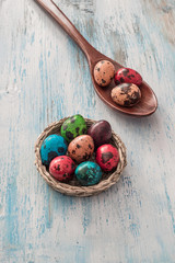 Happy Easter Quail eggs in a basket