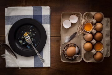 eating fried eggs flat lay still life rustic with food stylish