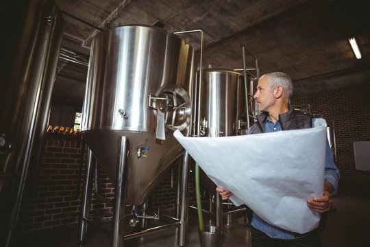 Local brewer standing in the plant