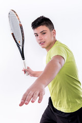 Cute Tennis Boy Swings with Racket