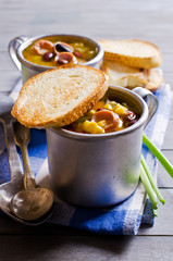 Soup with vegetables and sausages