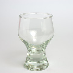 Transparent empty glass on a white background