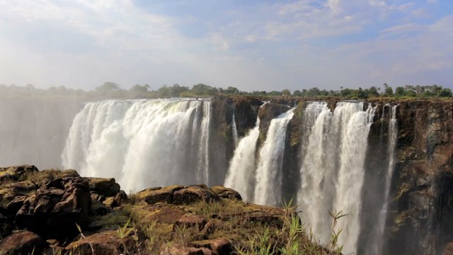 The Victoria falls is the largest curtain of water in the world (1708 meters wide). The falls and the surrounding area is the National Parks and World Heritage Site - Zambia, Zimbabwe