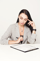 Portrait of a business woman with binder