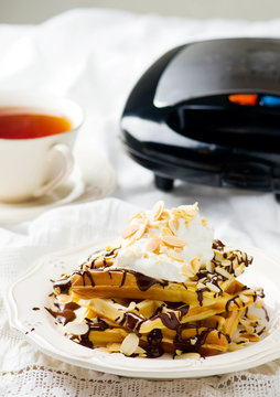 Vaffel with chocolate and whipped cream