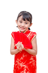 Young Asian girl in traditional chinese dress holding red packet