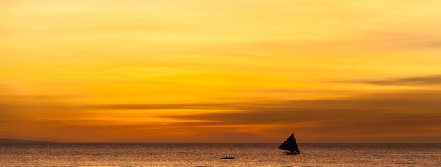 Beautiful sunset at Boracay, Philippines. Wide banner edition