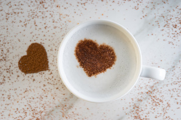 hot drink with heart shape cocoa
