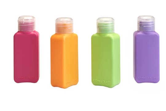 Four Multicolored  Small Plastic  Bottle Isolated On White