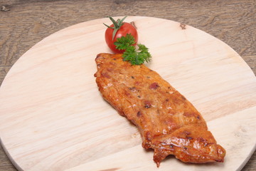 Beef steak on a wooden board