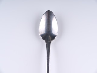 spoon on gray background