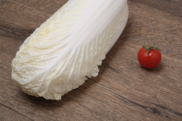 Tomato,Chinese cabbage on wooden floor