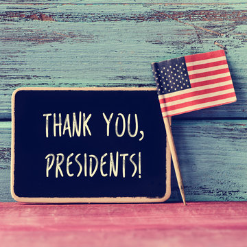 text thank you presidents in a chalkboard and the flag of the US