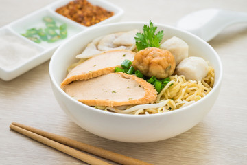 Noodles with fish balls in bowl