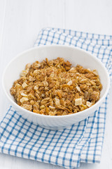 baked muesli in bowl, vertical