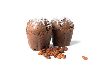 chocolate muffins with raisins isolated on white background