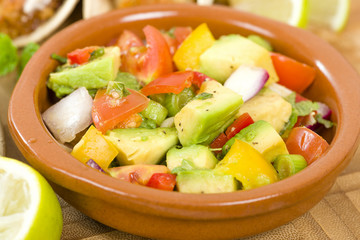 Chunky Guacamole - Mexican style guacamole with avocado, tomatoes, onions and peppers.