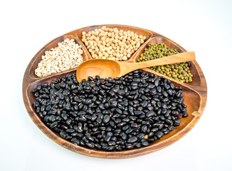 A variety of nuts in a cupon On a white background