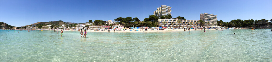 Calm clear ocean water beach panorama