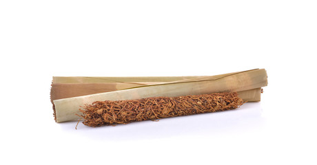 Tobacco  and cigarette on white background