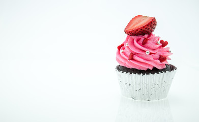 colorful cupcakes with beautiful decoration over white backgroun