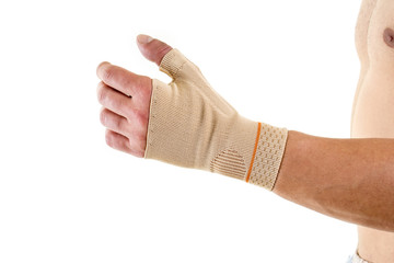 Man Wearing Flexible Wrist Brace in Studio.