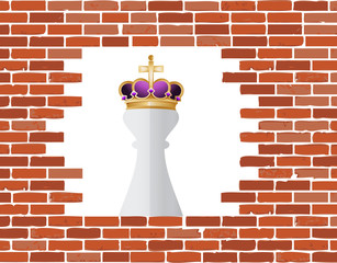 Chess king piece behind a brickwall