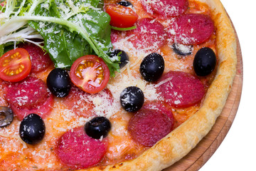 Whole salami pizza with cherry tomatoes