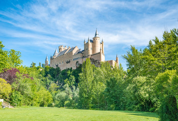 Fototapeta na wymiar The Alcazar of Segovia (literally, Segovia Castle) is a stone fo